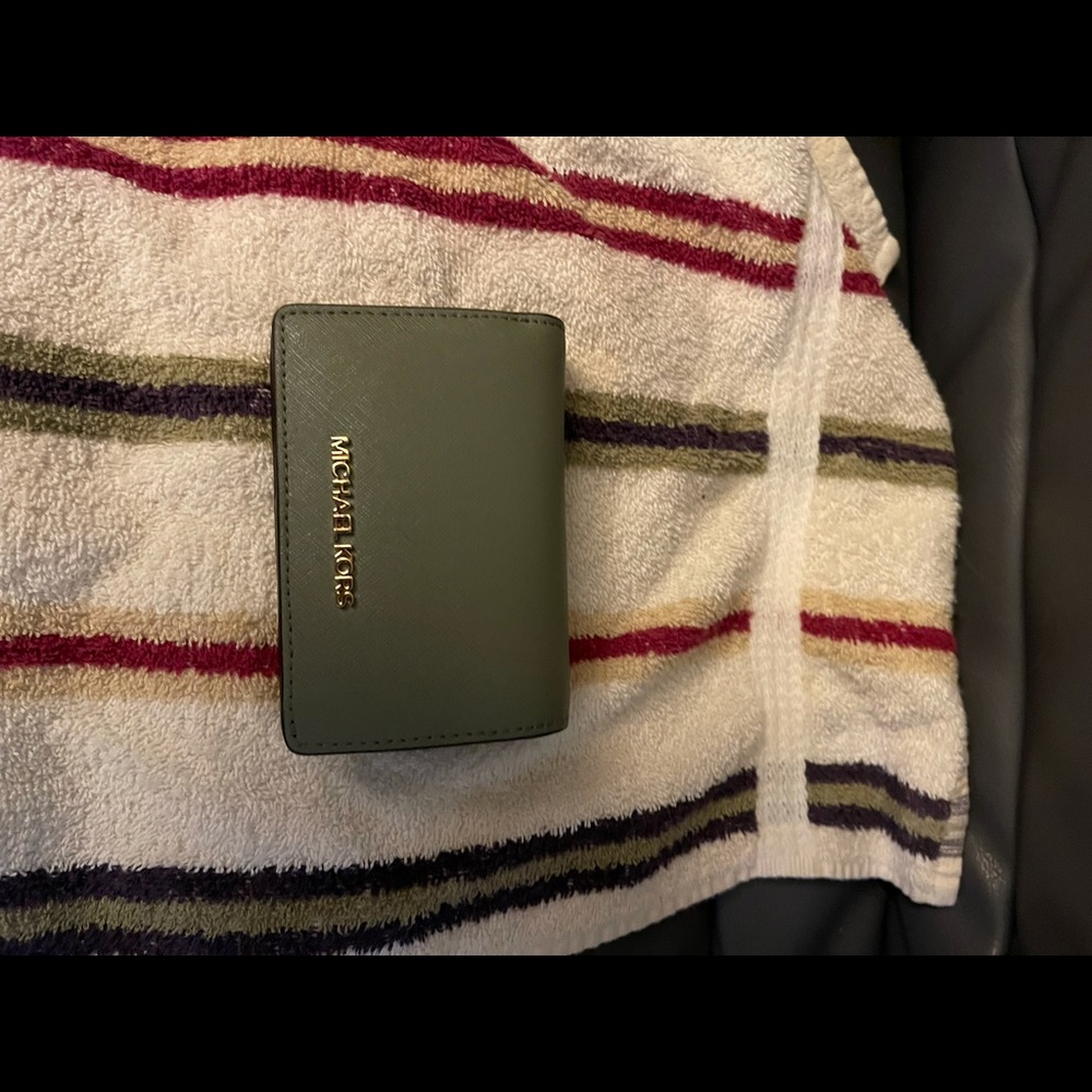MK wallet in olive green color
